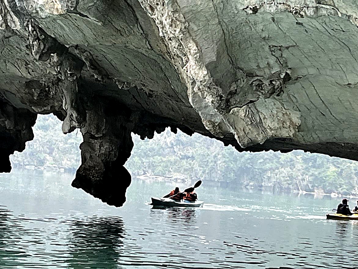 Kayaking Under the Arch, Ha Long Bay, Vietnam